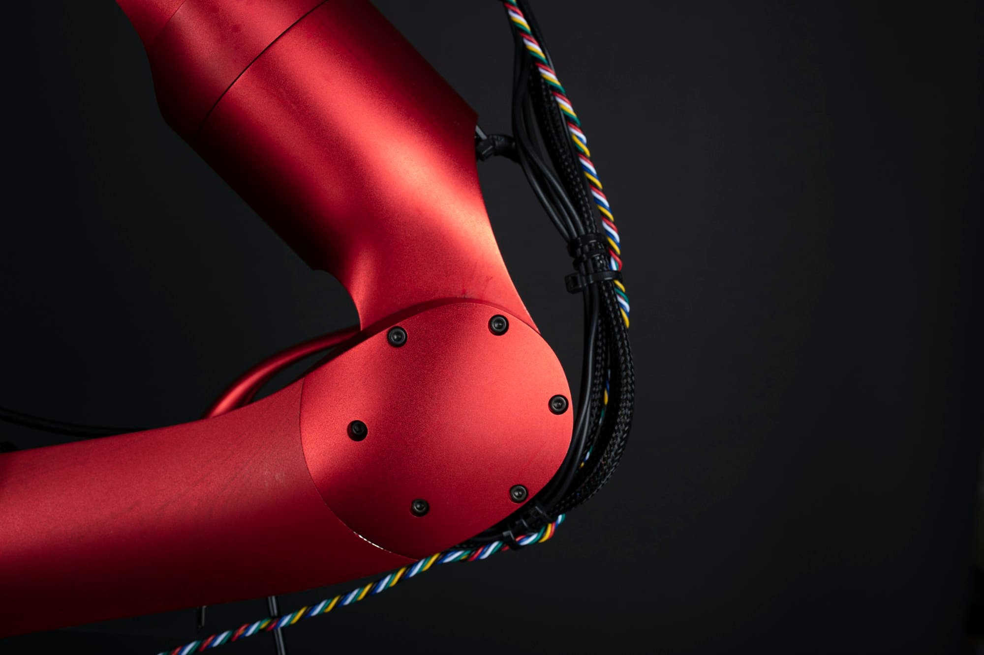 Close-up of a red robotic arm joint
