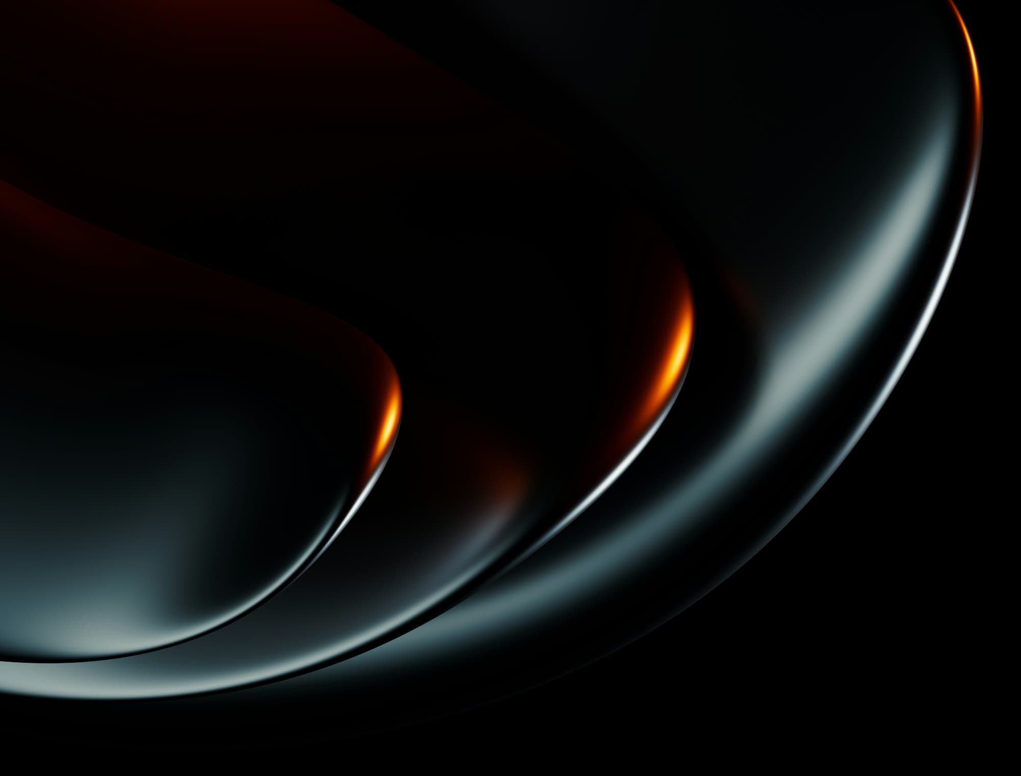 Dark metallic curves catching warm light